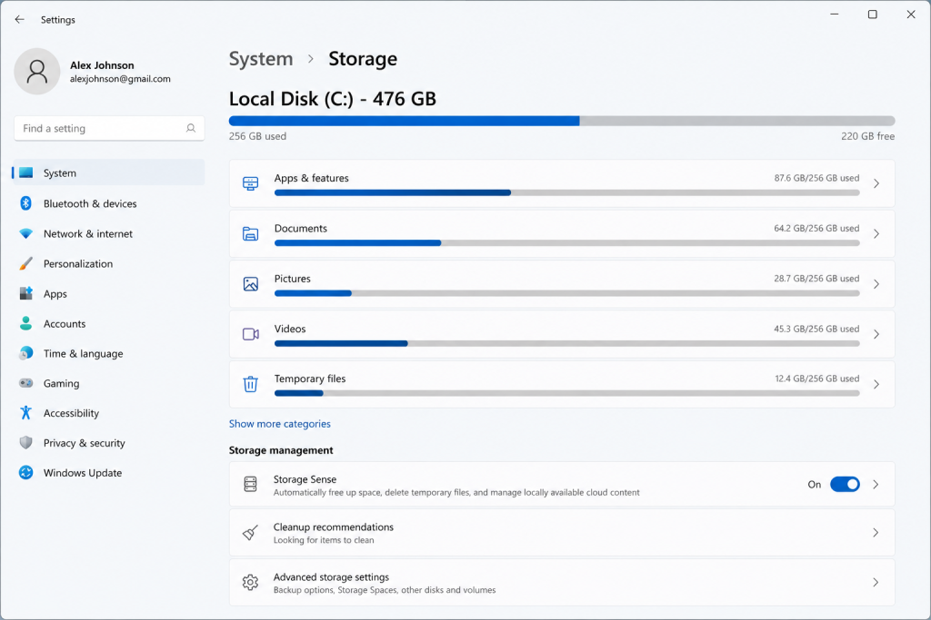 Windows 11 Storage Settings showing disk usage categories including apps, documents, pictures, videos, and temporary files